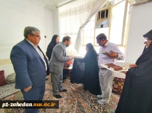 دیدار معاون اداری،مالی و مدیریت منابع دانشگاه ملی مهارت کشور با مادر شهیدان ارجمندی (مادر 3 شهید) 2