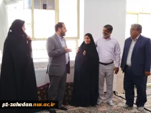 دیدار معاون اداری،مالی و مدیریت منابع دانشگاه ملی مهارت کشور با مادر شهیدان ارجمندی (مادر 3 شهید) 2
