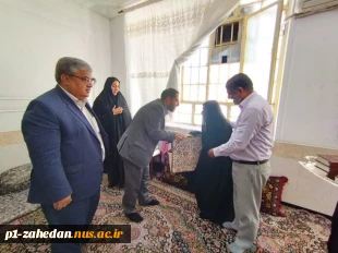 دیدار معاون اداری،مالی و مدیریت منابع دانشگاه ملی مهارت کشور با مادر شهیدان ارجمندی (مادر 3 شهید) 2