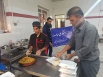 توزیع غذای گرم بین نیازمندان حاشیه شهر زاهدان  توسط کانون های بسیج دانشگاه ملی مهارت واحد استان سیستان و بلوچستان 7