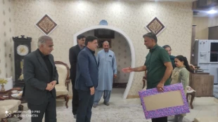 تجلیل هیئت رئیسه دانشگاه ملی مهارت واحد استانی سیستان و بلوچستان از مقام شامخ شهید «محمد نبی عارفی» 2